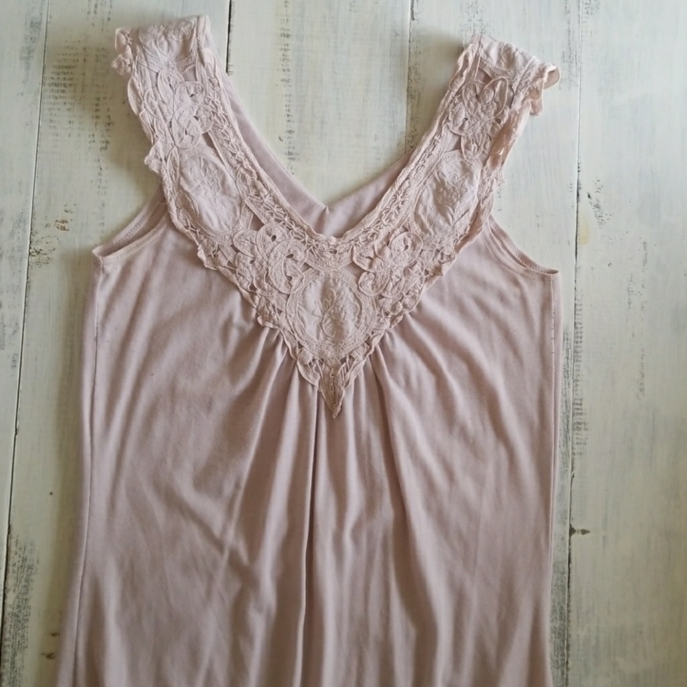 Light pink sleeveless blouse